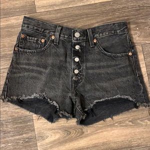 Black distressed Levi denim shorts